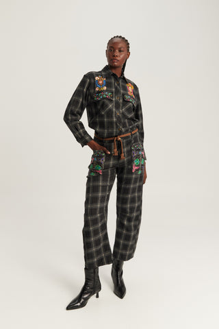 Woman wearing ME369 Jono embroidered plaid pants with braided rope belt